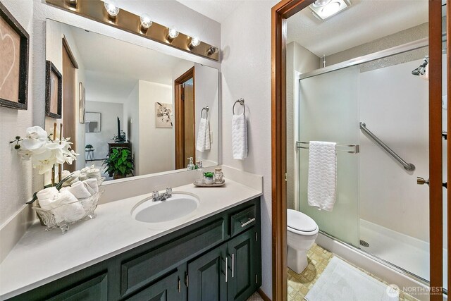 1130 5th Ave S Unit 103, Edmonds, WA 98020 - full bathroom with vanity and a shower stall