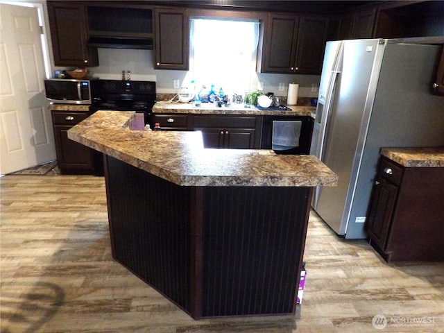 24919 Hoehn Rd Unit 65, Sedro Woolley, WA 98284 - kitchen with stainless steel appliances, under cabinet range hood, and dark brown cabinets