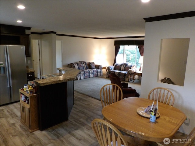 24919 Hoehn Rd Unit 65, Sedro Woolley, WA 98284 - dining room featuring crown molding, light wood-type flooring, and recessed lighting