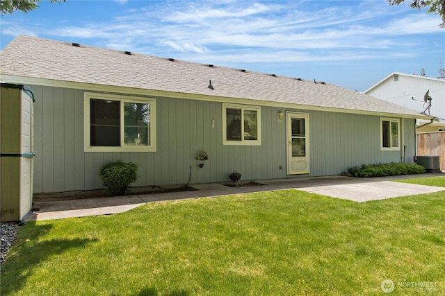 9927 140th St Ct E, Puyallup, WA 98373 - back of house featuring a shingled roof and a patio