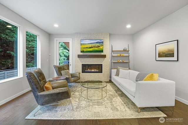 8015 NE 116th Pl, Kirkland, WA 98034 - living room featuring a large fireplace, wood finished floors, and recessed lighting