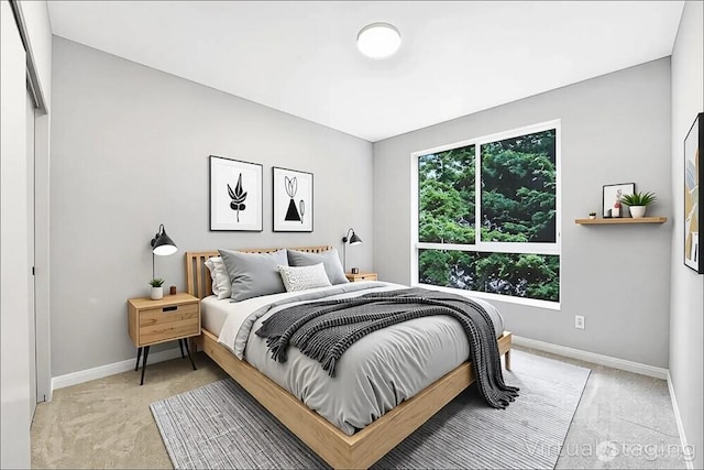 8015 NE 116th Pl, Kirkland, WA 98034 - bedroom with baseboards and light carpet