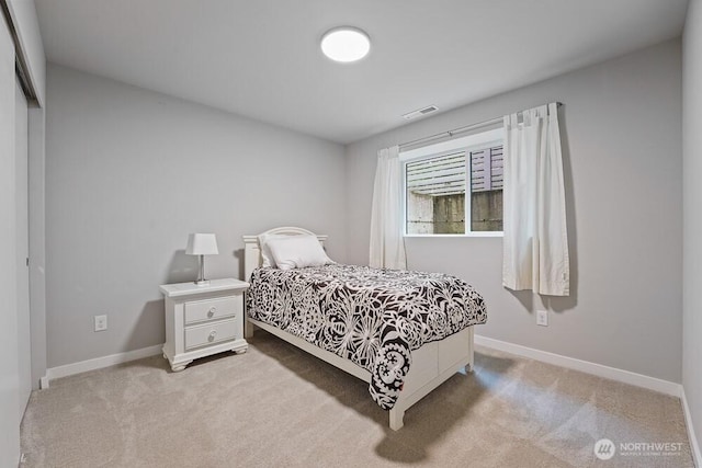 8015 NE 116th Pl, Kirkland, WA 98034 - bedroom featuring light colored carpet and a closet