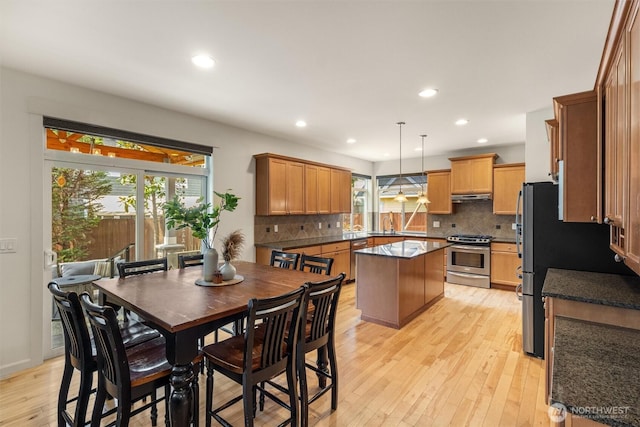 416 199th Pl SE, Bothell, WA 98012 - dining space with plenty of natural light, light wood finished floors, and recessed lighting