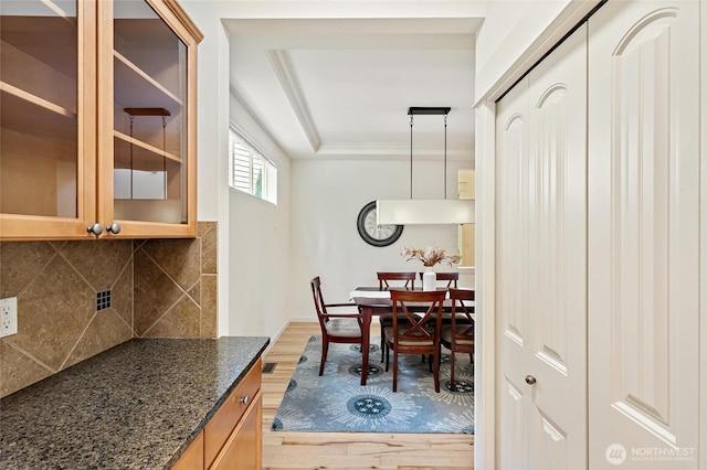 416 199th Pl SE, Bothell, WA 98012 - dining space with light wood-type flooring and a raised ceiling