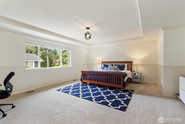 416 199th Pl SE, Bothell, WA 98012 - bedroom with a wainscoted wall, carpet floors, a tray ceiling, and crown molding