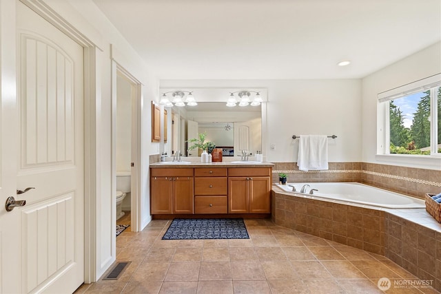 416 199th Pl SE, Bothell, WA 98012 - bathroom with double vanity, a garden tub, and tile patterned flooring