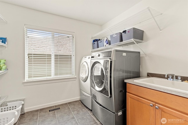416 199th Pl SE, Bothell, WA 98012 - laundry room with washer and dryer and light tile patterned flooring