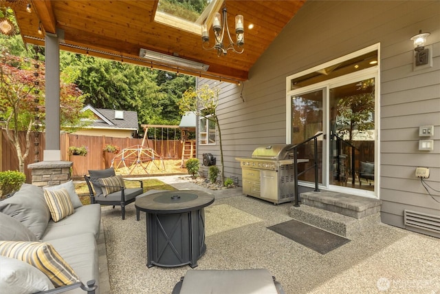 416 199th Pl SE, Bothell, WA 98012 - view of patio / terrace with an outdoor living space with a fire pit and grilling area
