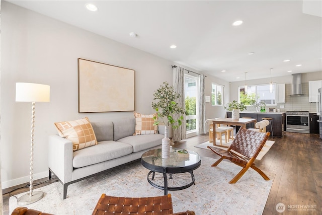 8600 21st Pl NE, Seattle, WA 98115 - living area with recessed lighting and dark wood-style floors