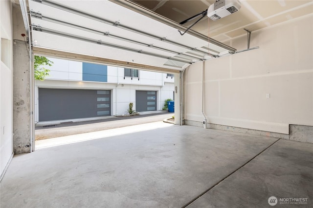 8600 21st Pl NE, Seattle, WA 98115 - garage featuring a garage door opener