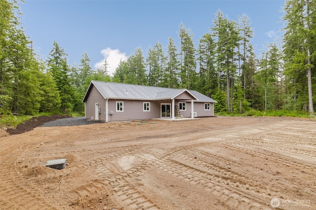 300 E Wild Grape Way, Grapeview, WA 98546 - view of front facade with driveway