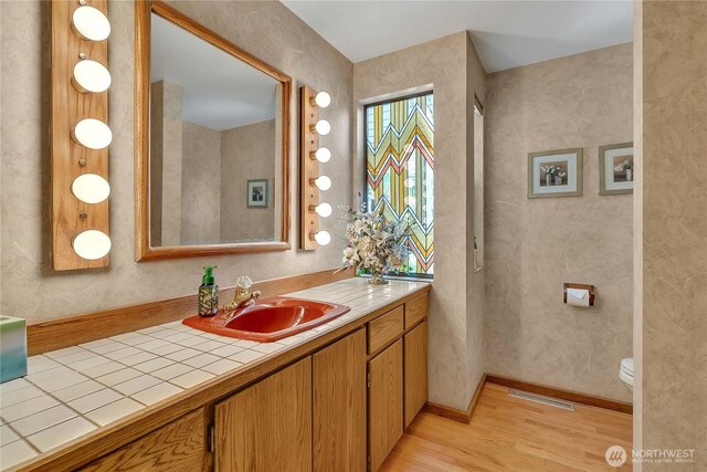 20219 SE 344th St, Auburn, WA 98092 - bathroom with wood finished floors and vanity