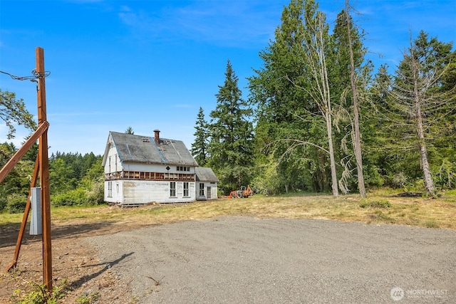 3634 Campbell St NE, Bainbridge Island, WA 98110 - view of front facade with a chimney