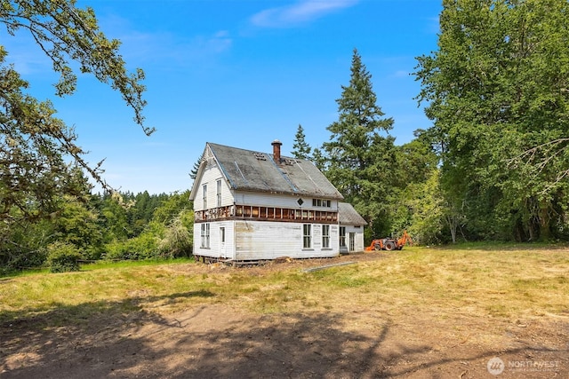3634 Campbell St NE, Bainbridge Island, WA 98110 - view of property exterior with a view of trees