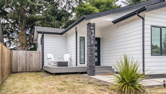 793 Island Cir SE, Ocean Shores, WA 98569 - view of property exterior with a wooden deck