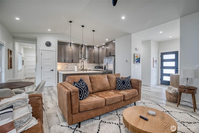 793 Island Cir SE, Ocean Shores, WA 98569 - living area featuring light wood-style floors, recessed lighting, and lofted ceiling