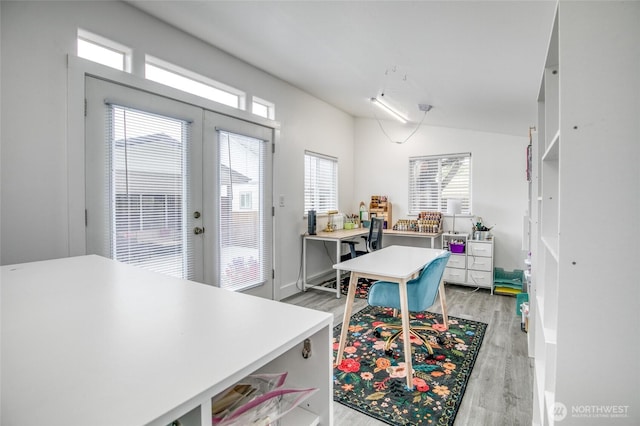 793 Island Cir SE, Ocean Shores, WA 98569 - office with light wood finished floors, french doors, plenty of natural light, and lofted ceiling