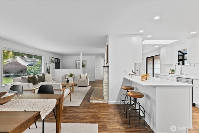 7411 201st St SW, Lynnwood, WA 98036 - living room featuring wood finished floors and recessed lighting