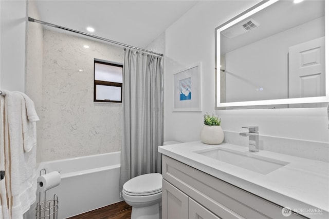 7411 201st St SW, Lynnwood, WA 98036 - full bath featuring vanity, shower / tub combo with curtain, and wood finished floors