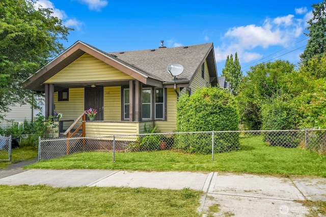 3108 S Walden St, Seattle, WA 98144 - view of front of home featuring a fenced front yard, a shingled roof, and covered porch