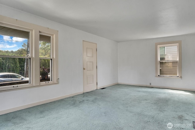 3108 S Walden St, Seattle, WA 98144 - carpeted spare room with plenty of natural light and crown molding