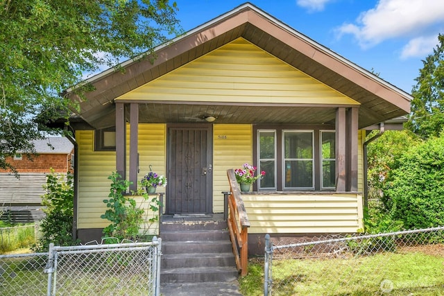 3108 S Walden St, Seattle, WA 98144 - shotgun-style home featuring a porch