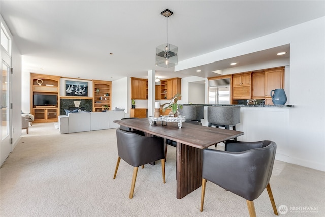2015 SE Columbia River Dr Unit 320, Vancouver, WA 98661 - dining area with light carpet, recessed lighting, and built in features