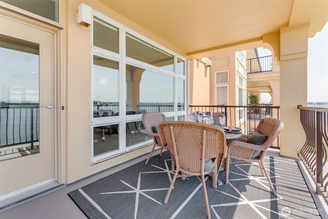2015 SE Columbia River Dr Unit 320, Vancouver, WA 98661 - balcony featuring a water view and outdoor dining area