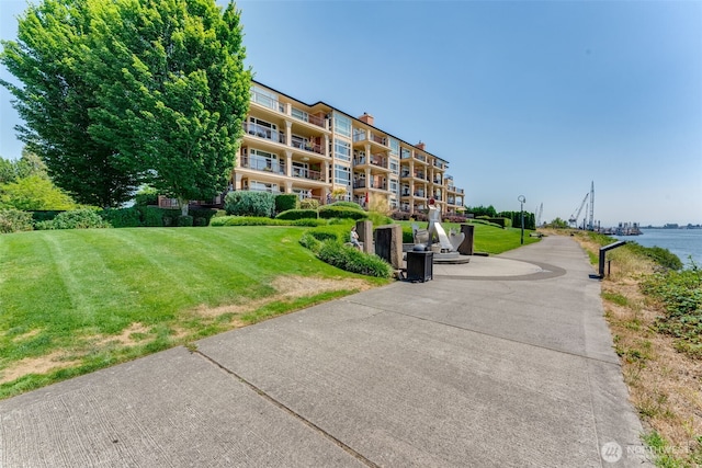 2015 SE Columbia River Dr Unit 320, Vancouver, WA 98661 - view of home's community featuring a lawn and a water view