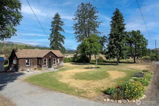 50 Lower Bear Creek Rd, Winthrop, WA 98862 - view of front of property with a mountain view and a front lawn