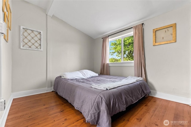 50 Lower Bear Creek Rd, Winthrop, WA 98862 - bedroom featuring lofted ceiling and wood finished floors