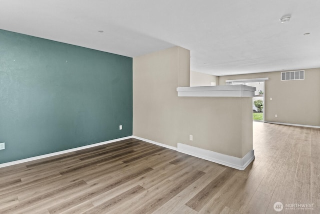 2237 Tolmie St, Dupont, WA 98327 - unfurnished room featuring wood finished floors and a smoke detector