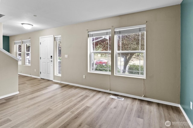 2237 Tolmie St, Dupont, WA 98327 - foyer featuring wood finished floors and baseboards