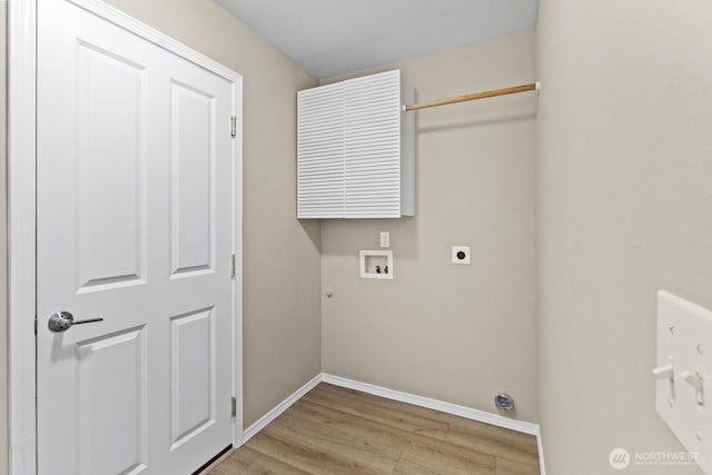2237 Tolmie St, Dupont, WA 98327 - laundry room with washer hookup, hookup for an electric dryer, light wood-style floors, and hookup for a gas dryer