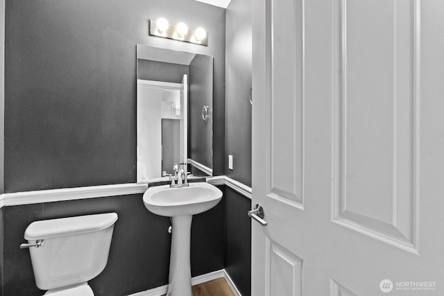2237 Tolmie St, Dupont, WA 98327 - bathroom with toilet and baseboards
