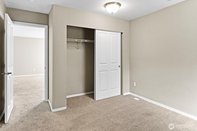 2237 Tolmie St, Dupont, WA 98327 - unfurnished bedroom featuring carpet flooring and a closet
