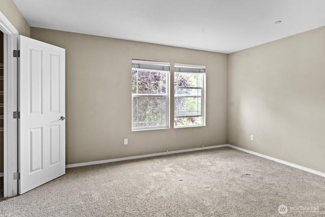 2237 Tolmie St, Dupont, WA 98327 - carpeted empty room with baseboards