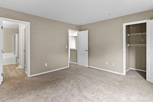 2237 Tolmie St, Dupont, WA 98327 - unfurnished bedroom with carpet, a closet, and ensuite bathroom