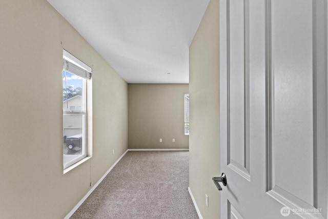 2237 Tolmie St, Dupont, WA 98327 - corridor with carpet floors and healthy amount of natural light