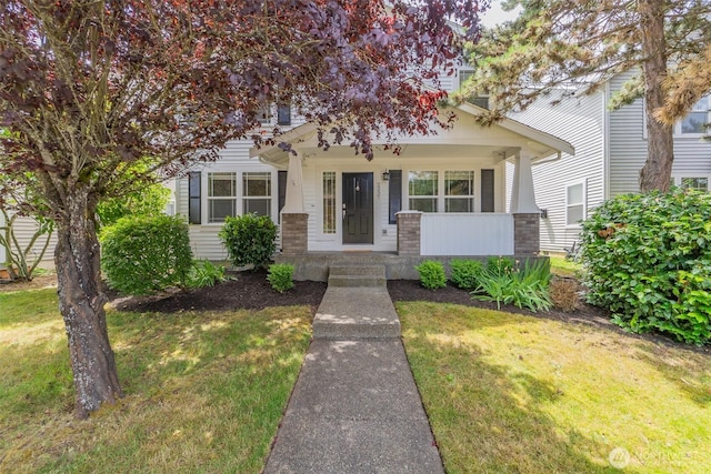 2237 Tolmie St, Dupont, WA 98327 - view of front of home with a front lawn and covered porch