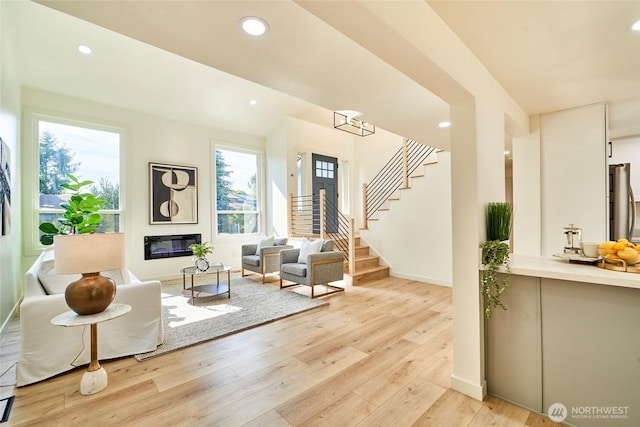 27409 146th Ave SE, Kent, WA 98042 - living room featuring stairway, light wood-style flooring, and recessed lighting