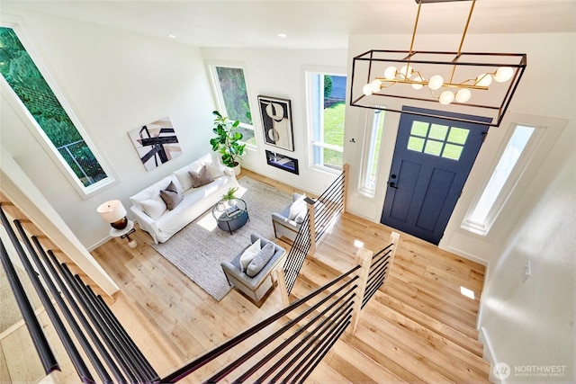 27409 146th Ave SE, Kent, WA 98042 - living room featuring wood finished floors, a chandelier, and recessed lighting