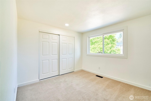 27409 146th Ave SE, Kent, WA 98042 - unfurnished bedroom featuring carpet floors, a closet, and recessed lighting