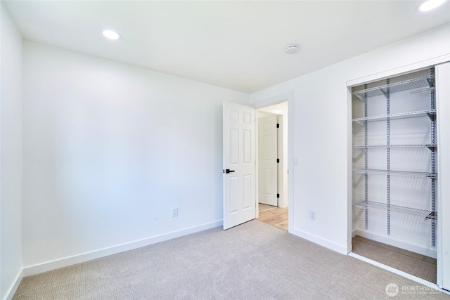 27409 146th Ave SE, Kent, WA 98042 - unfurnished bedroom featuring carpet, recessed lighting, and a closet