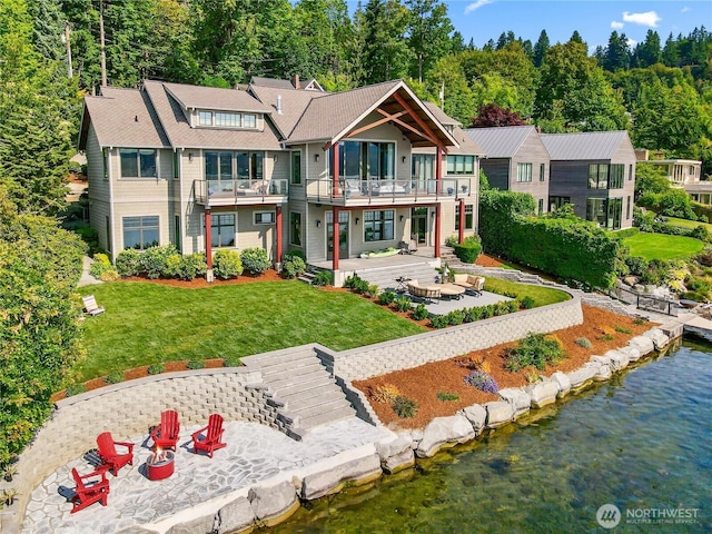 8440 Benotho Pl, Mercer Island, WA 98040 - rear view of property with a patio area, a balcony, a lawn, and a water view