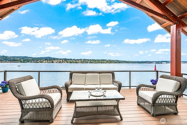 8440 Benotho Pl, Mercer Island, WA 98040 - wooden terrace with a water view and an outdoor living space