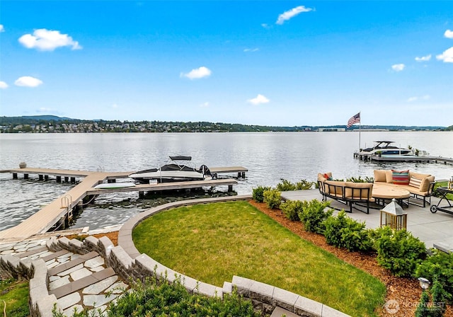 8440 Benotho Pl, Mercer Island, WA 98040 - dock with a water view, boat lift, and a lawn
