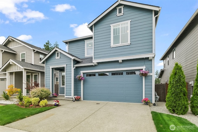 9018 Viola St SE, Tumwater, WA 98501 - traditional-style house featuring an attached garage and concrete driveway