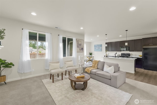 9018 Viola St SE, Tumwater, WA 98501 - living room with recessed lighting and light colored carpet
